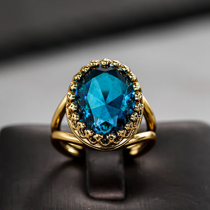 Elegant Gold Plated Oval Blue Stone Ring