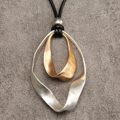 Elegant Modern Mixed-Metal Abstract Pendant Necklace