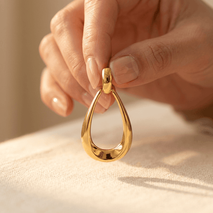 Gold Polished Teardrop Dangle Earrings
